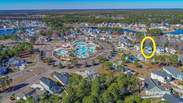 aerial view featuring a residential view and a water view