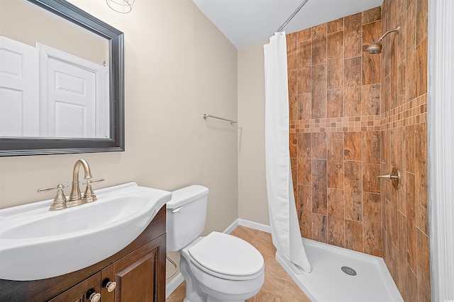 bathroom with walk in shower, vanity, toilet, and tile floors