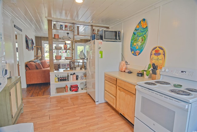 kitchen featuring light hardwood / wood-style floors, white appliances, and crown molding