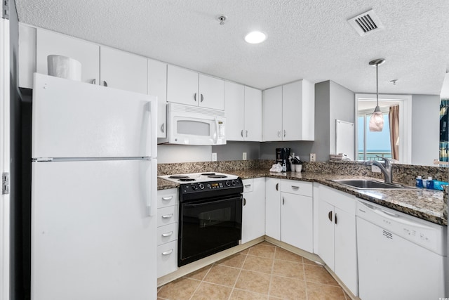 kitchen with hanging light fixtures, white appliances, a textured ceiling, white cabinetry, and sink