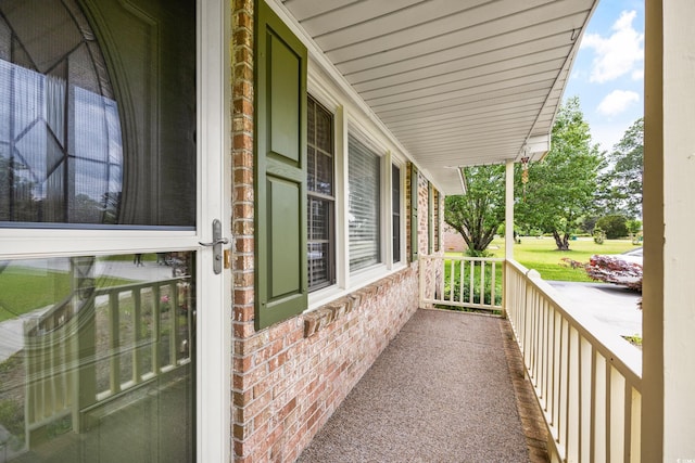 balcony featuring covered porch