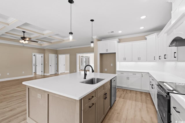 kitchen featuring hanging light fixtures, light wood-type flooring, a center island with sink, sink, and coffered ceiling