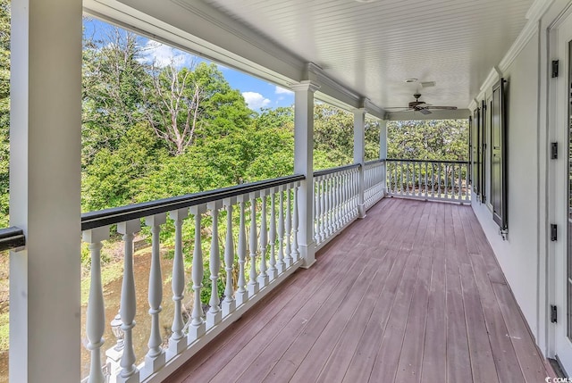 wooden terrace with ceiling fan