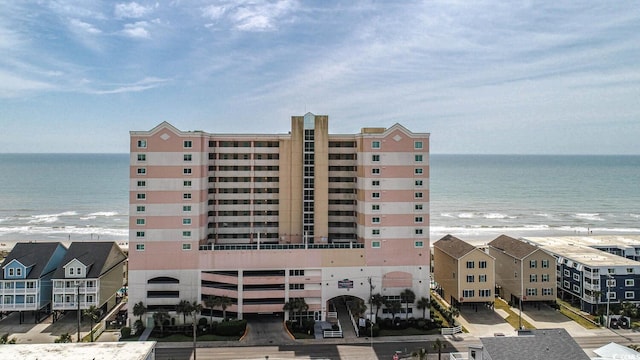 view of building exterior featuring a water view