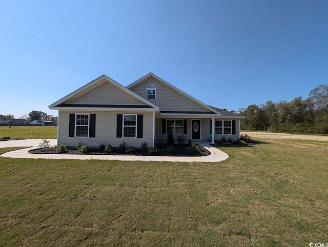 view of front of property with a front lawn