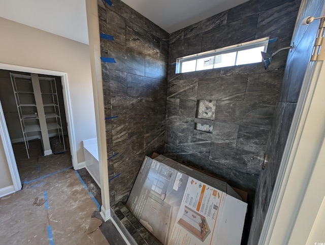 bathroom featuring walk in shower