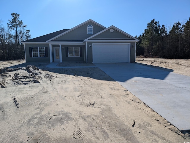 view of front of home with a garage