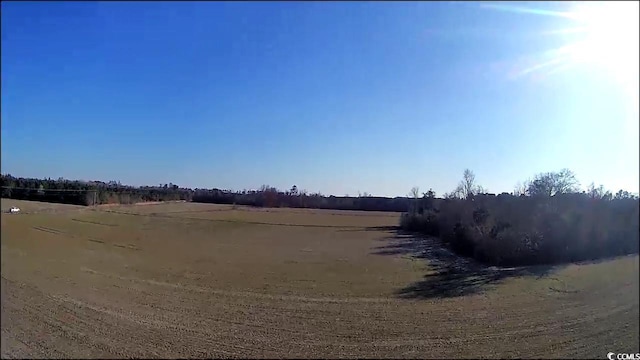 view of yard featuring a rural view