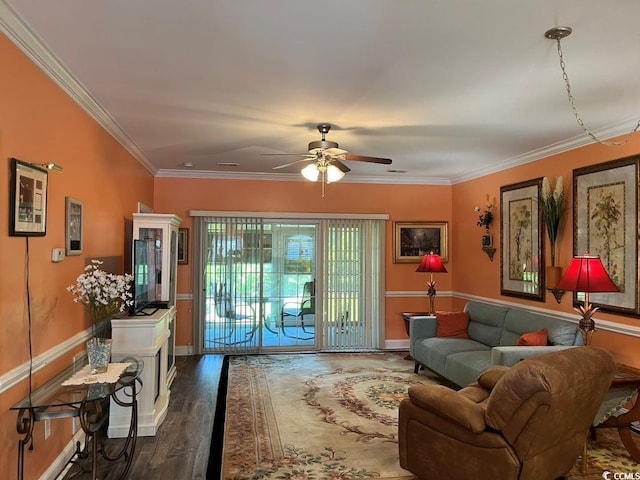 living room featuring ornamental molding, ceiling fan, and dark hardwood / wood-style floors