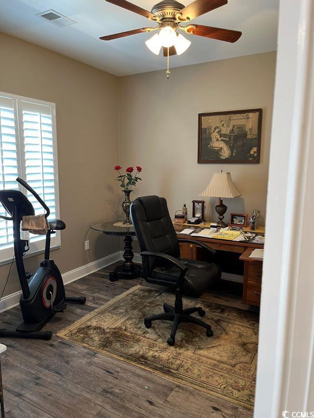 office featuring ceiling fan and dark hardwood / wood-style floors