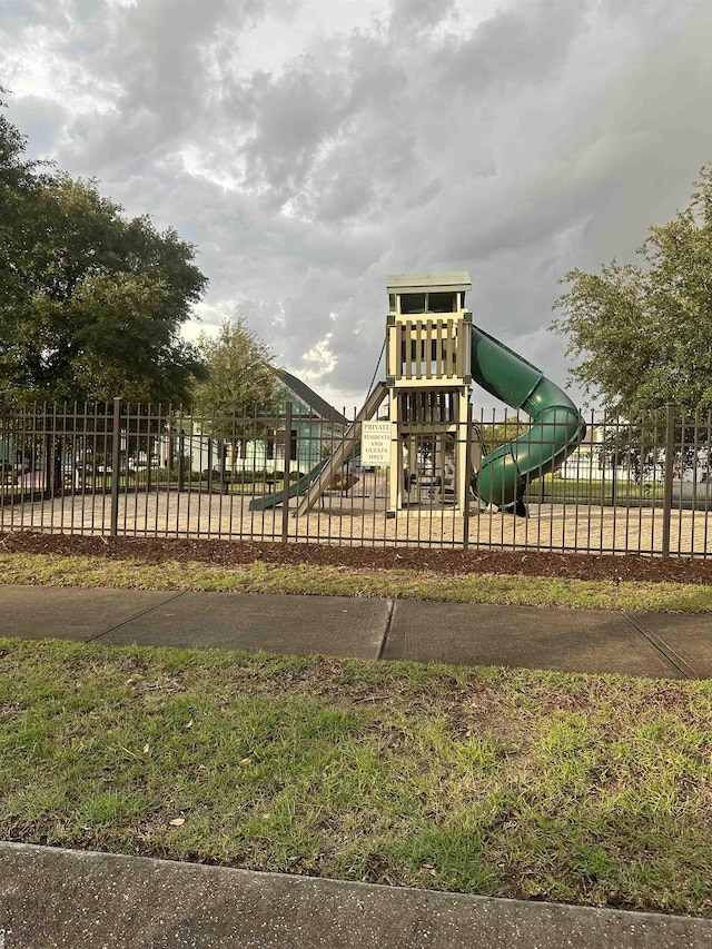 community play area featuring fence