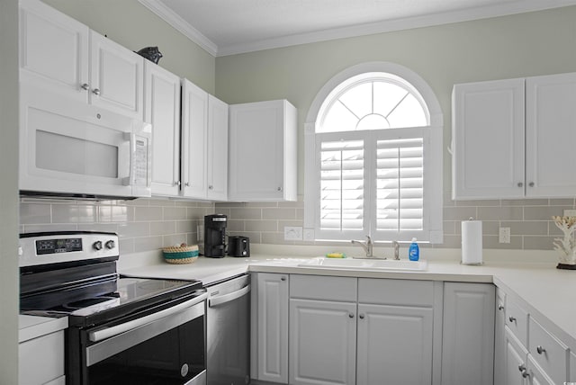 kitchen with white cabinetry, sink, and stainless steel appliances