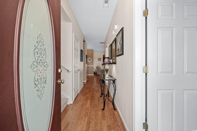 hall featuring light wood-type flooring