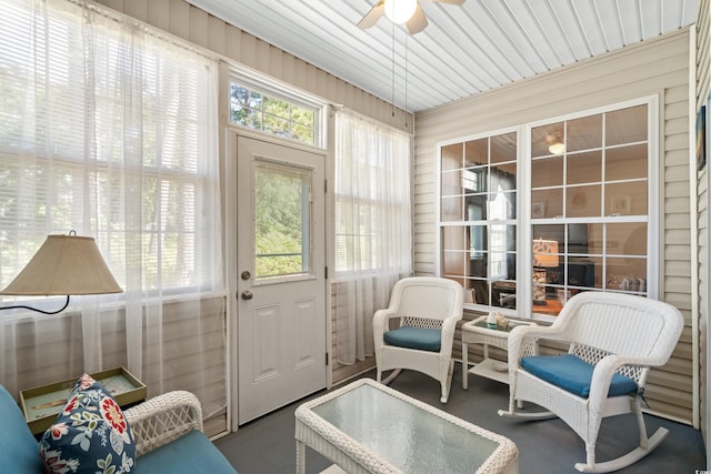 sunroom / solarium with ceiling fan