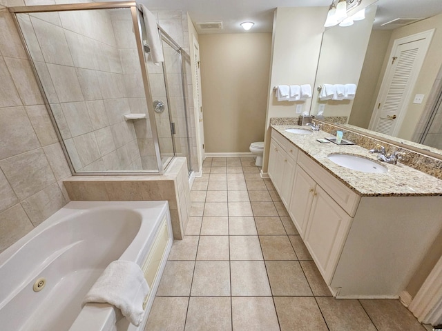 full bathroom with separate shower and tub, oversized vanity, tile flooring, dual sinks, and toilet