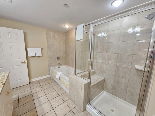 bathroom featuring tile flooring, vanity, and plus walk in shower