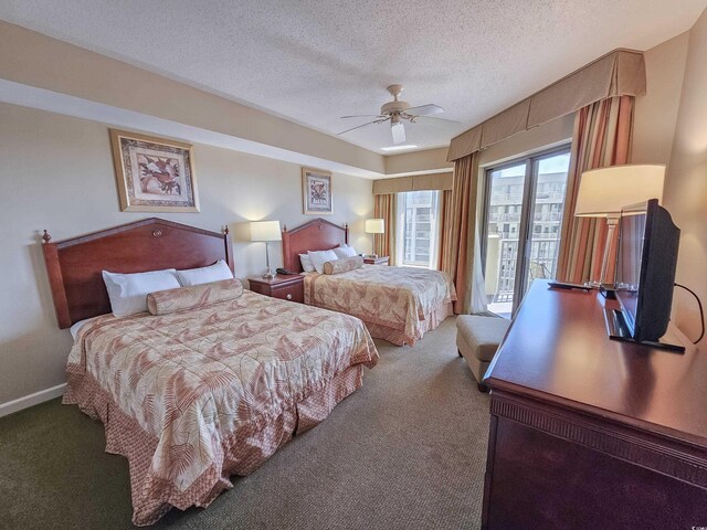 bedroom featuring ceiling fan, carpet flooring, access to exterior, and a textured ceiling