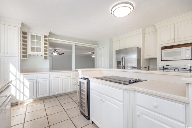 kitchen featuring wine cooler, white microwave, light tile floors, stainless steel fridge with ice dispenser, and ceiling fan