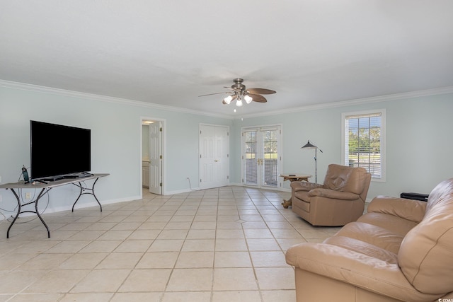 living room with crown molding, ceiling fan, and light tile floors