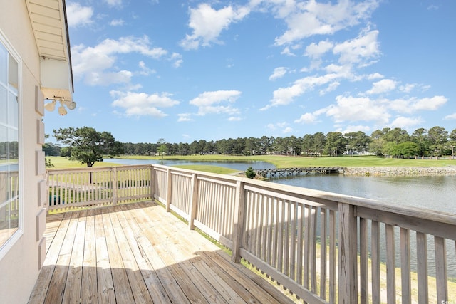 wooden deck with a water view