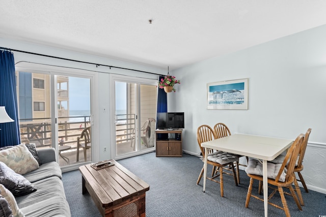 view of carpeted dining space