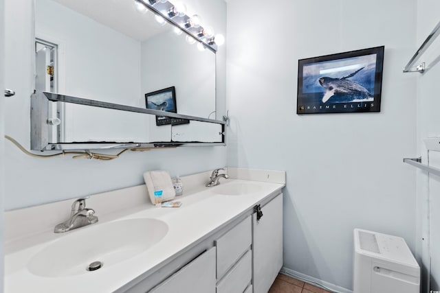 bathroom with vanity and tile patterned flooring