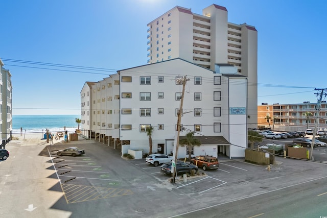 view of building exterior featuring a water view