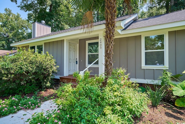 view of property exterior featuring cooling unit and a yard