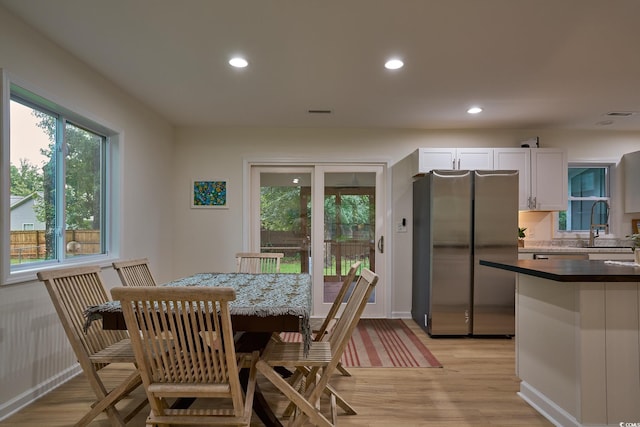 dining room featuring light hardwood / wood-style flooring