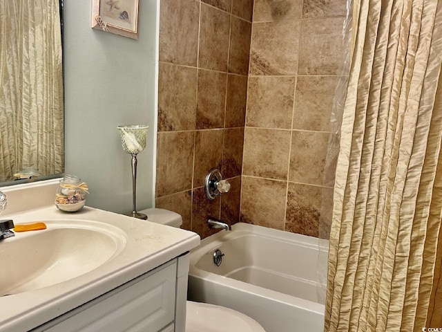 full bathroom featuring sink, shower / bathtub combination with curtain, and toilet