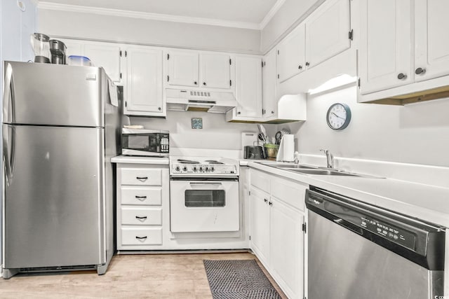 kitchen with light wood-type flooring, white cabinetry, ornamental molding, appliances with stainless steel finishes, and sink