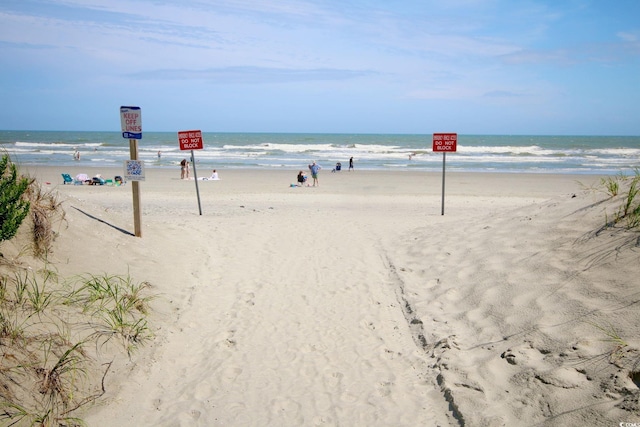 view of water feature featuring a beach view