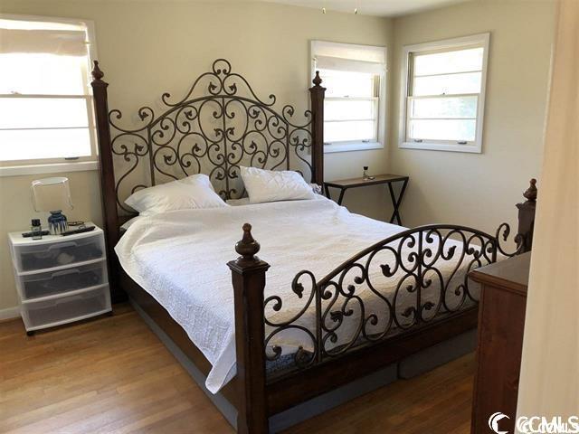 bedroom featuring hardwood / wood-style floors