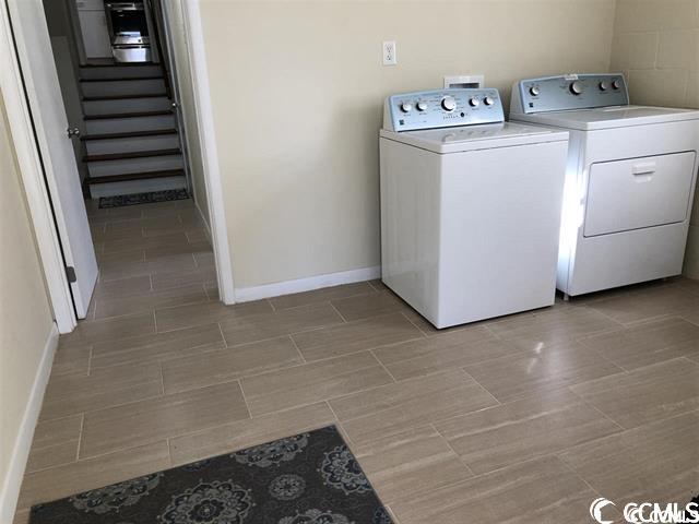 washroom featuring separate washer and dryer