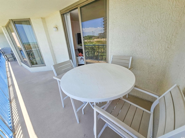 balcony with outdoor dining area