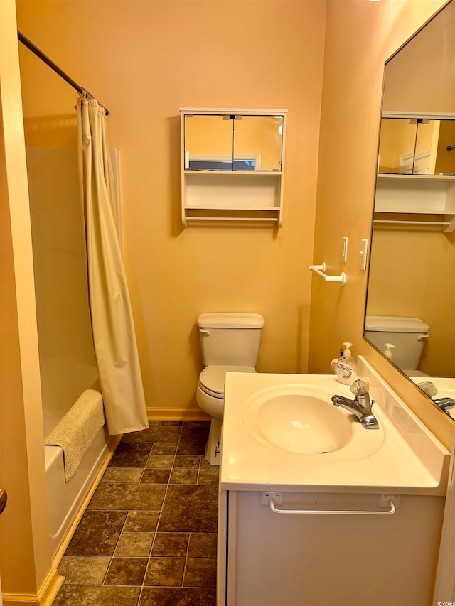 full bathroom featuring shower / bath combo with shower curtain, toilet, tile floors, and vanity