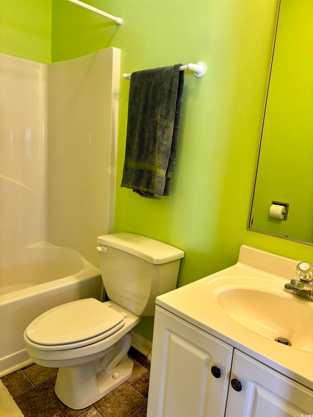 full bathroom with toilet, tile flooring, vanity, and bathing tub / shower combination