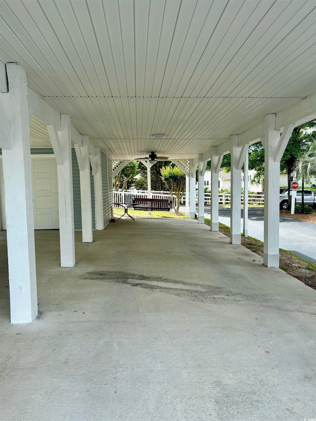 exterior space with ceiling fan