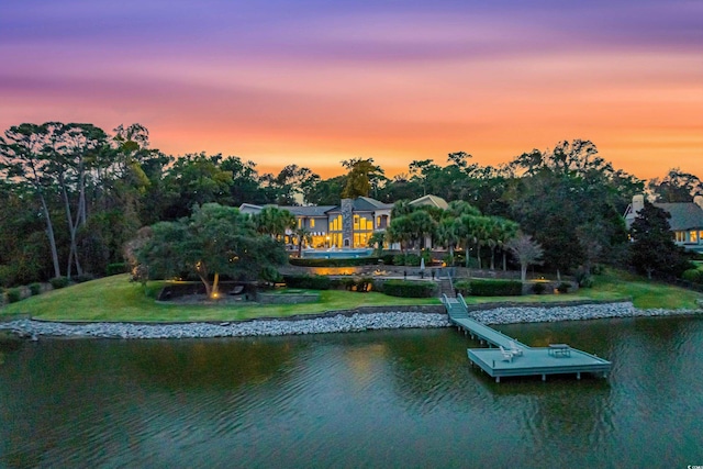 9400 Lake Dr, Myrtle Beach, SC 29572 - view of dock with a water view and a yard