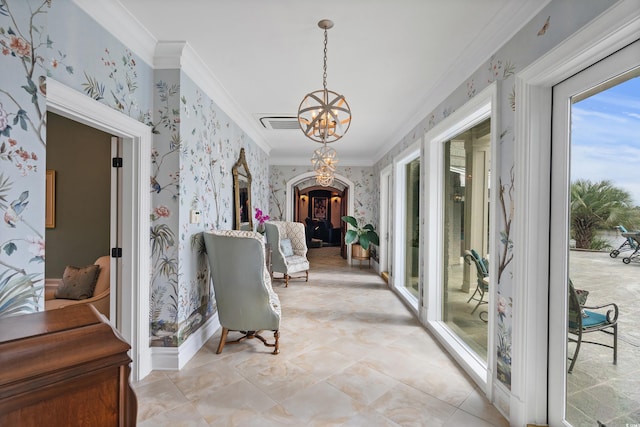 9400 Lake Dr, Myrtle Beach, SC 29572 - hallway with a notable chandelier, crown molding, visible vents, baseboards, and wallpapered walls
