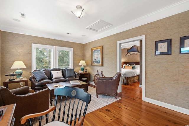 9400 Lake Dr, Myrtle Beach, SC 29572 - living room featuring attic access, wood finished floors, baseboards, visible vents, and ornamental molding