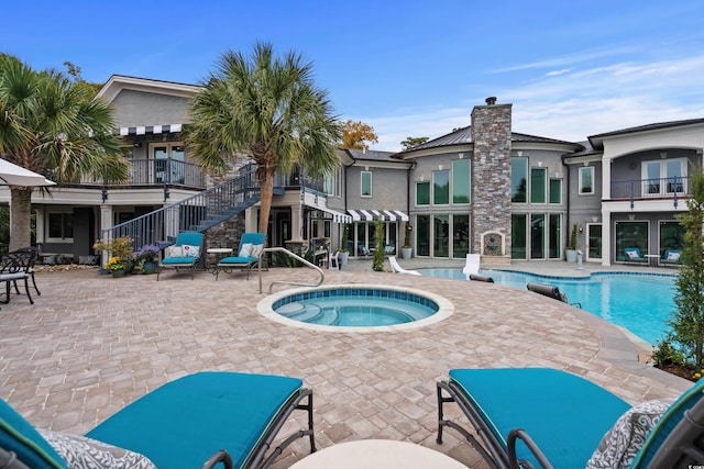 9400 Lake Dr, Myrtle Beach, SC 29572 - pool with a patio area and an in ground hot tub