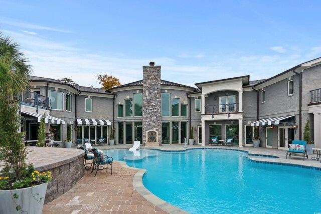9400 Lake Dr, Myrtle Beach, SC 29572 - pool featuring french doors and a patio area
