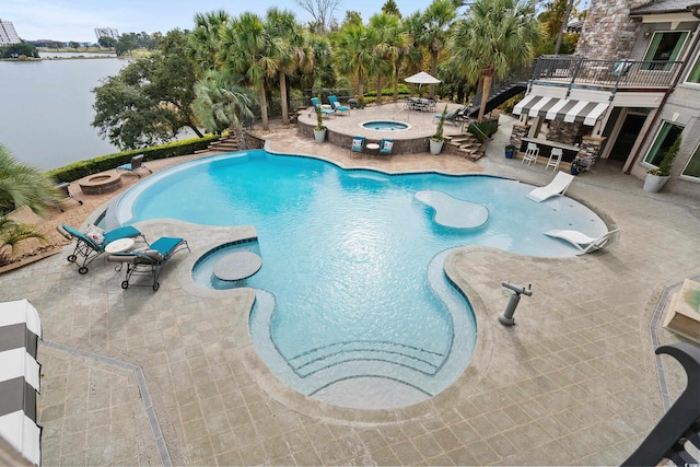 9400 Lake Dr, Myrtle Beach, SC 29572 - community pool featuring a water view, a patio area, and a hot tub