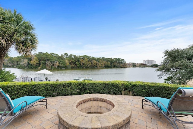 9400 Lake Dr, Myrtle Beach, SC 29572 - view of patio / terrace featuring a fire pit and a water view