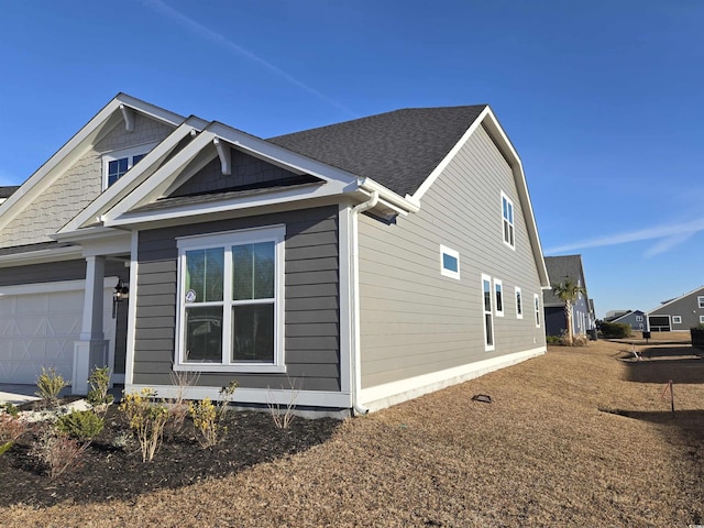 view of home's exterior featuring a garage