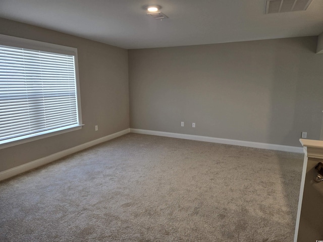 view of carpeted spare room