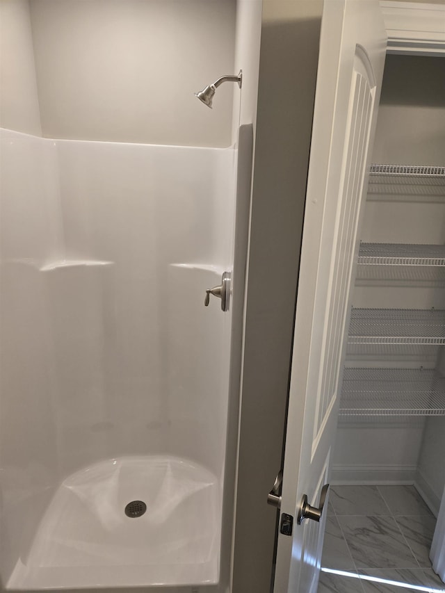 bathroom featuring a shower