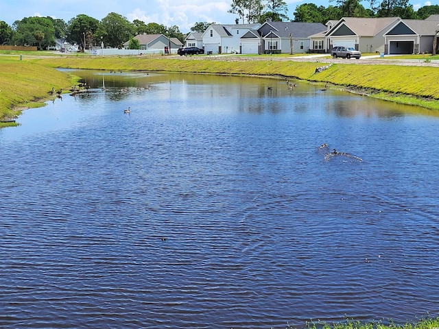 property view of water with a residential view