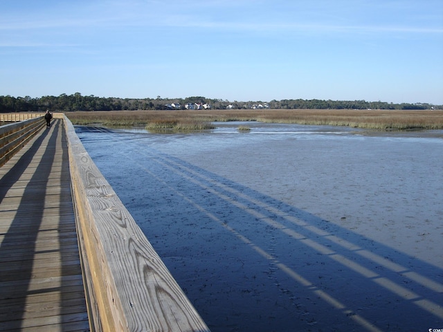 exterior space with a water view